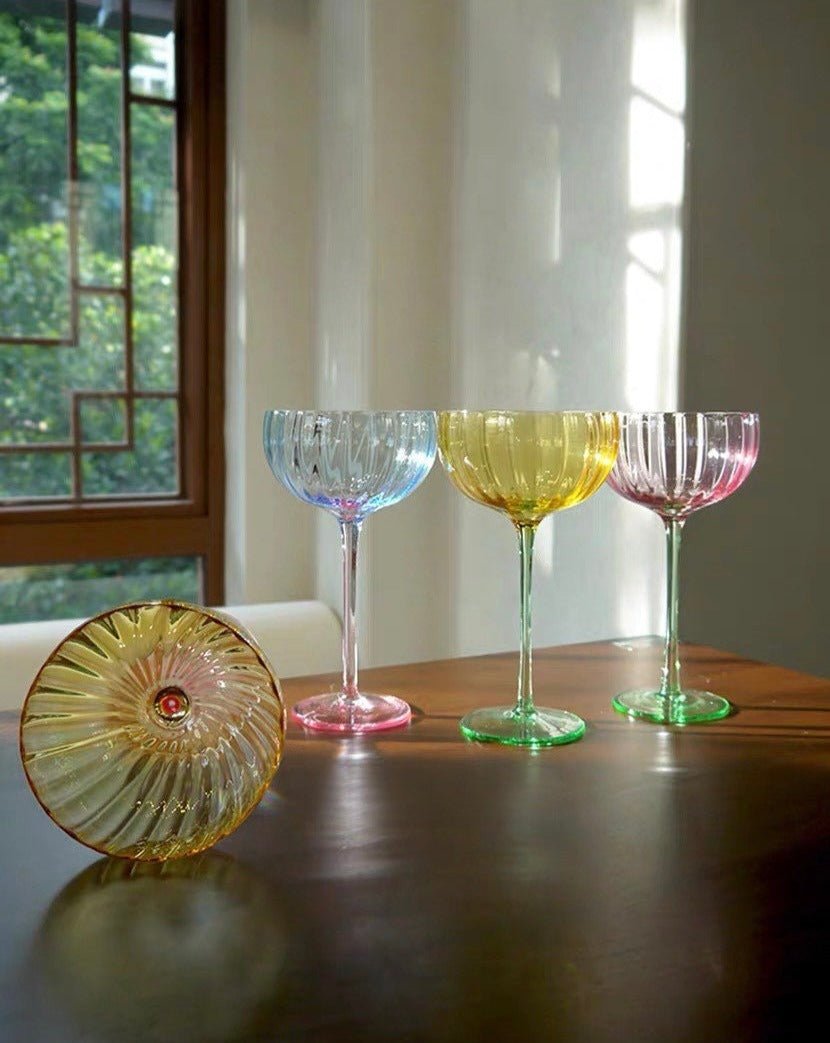 Designed for elevated entertaining, these coupe glasses add a playful yet sophisticated touch to cocktails, champagne, and desserts.